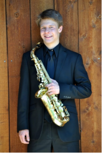 Drew Zaremba with saxophone