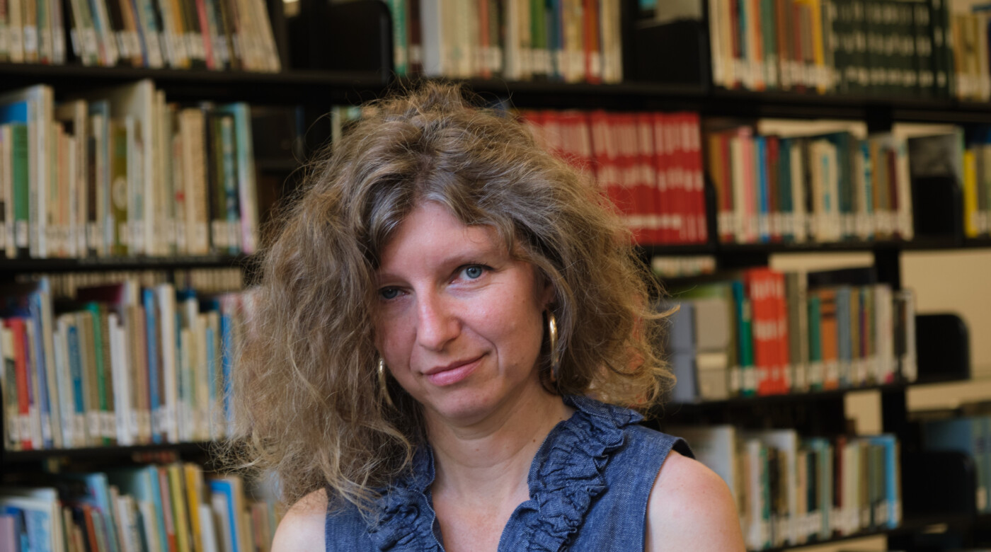 Professor Rebecca Wilkin in the PLU library in 2020.
