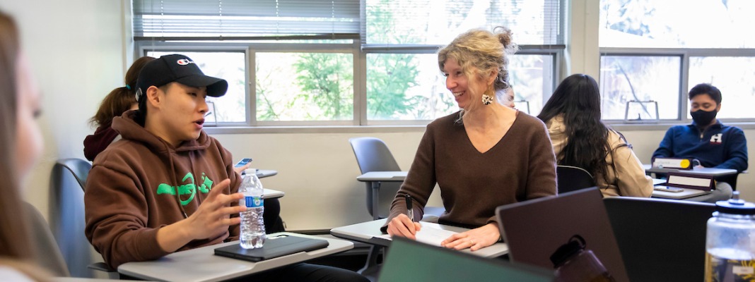 Students do coursework with professor Rebecca Wilkin in their FREN 406 course titled “French / Francophone Feminisms,” Tuesday, April 4, 2023, at PLU. (PLU Photo / Sy Bean)