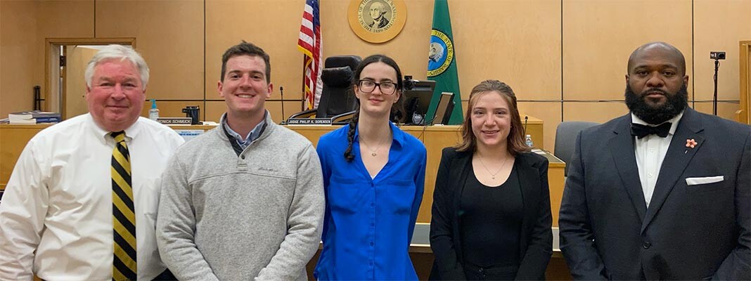 (From left to right) Honorable Philip K. Sorensen, Connor Lemma ’22, Makaela Whalen ’23, Calissa Hagen ’24, Honorable Clarence Henderson, Jr. (photo courtesy of Judge Sorensen)