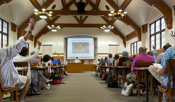 A group of students inside the Rainer Writing Workshop class