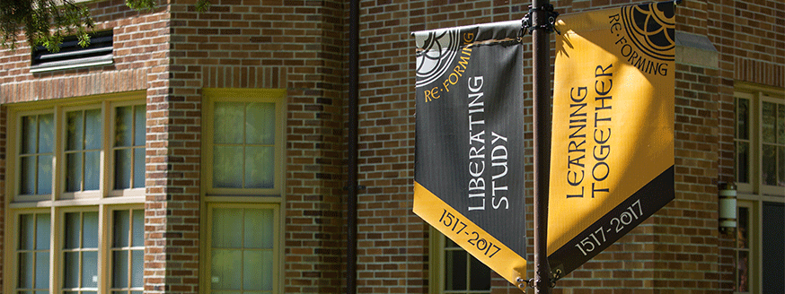 Re-forming banners on campus by Xavier Hall.