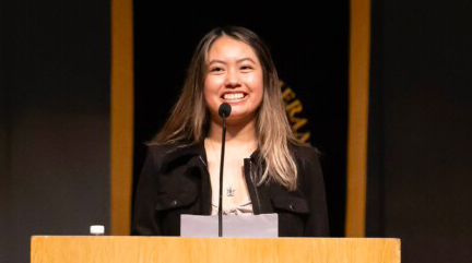 Yisel Morales ’23, MAE ’24 shares her perspective as an alum at the 2025 Convocation ceremony in Olson Auditorium.