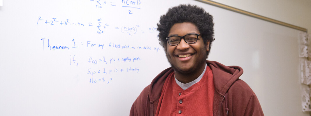 Kevin in front of whiteboard