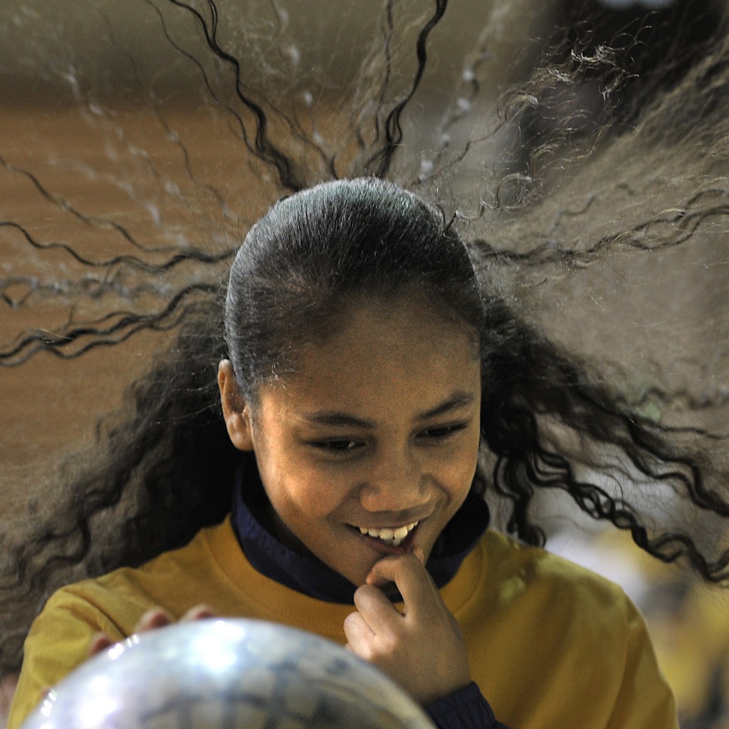 Static Electricity at the Pierce College Science Dome display was a real draw following the competition and before the awards presentation by Jade Daniels (11), a 6th grader with long hair from 1st. Creek Middle School.