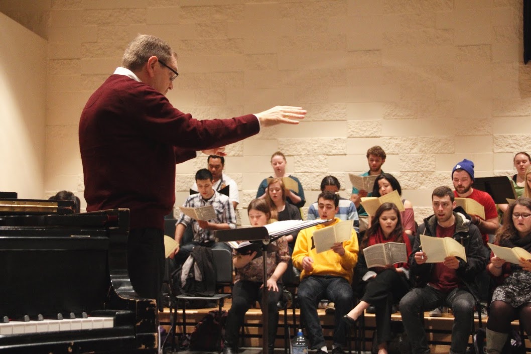 Dr. Richard Nance, left, conducts a Choir of the West rehearsal on Nov. 3, 2014. (Photo: Shunying Wang '15)