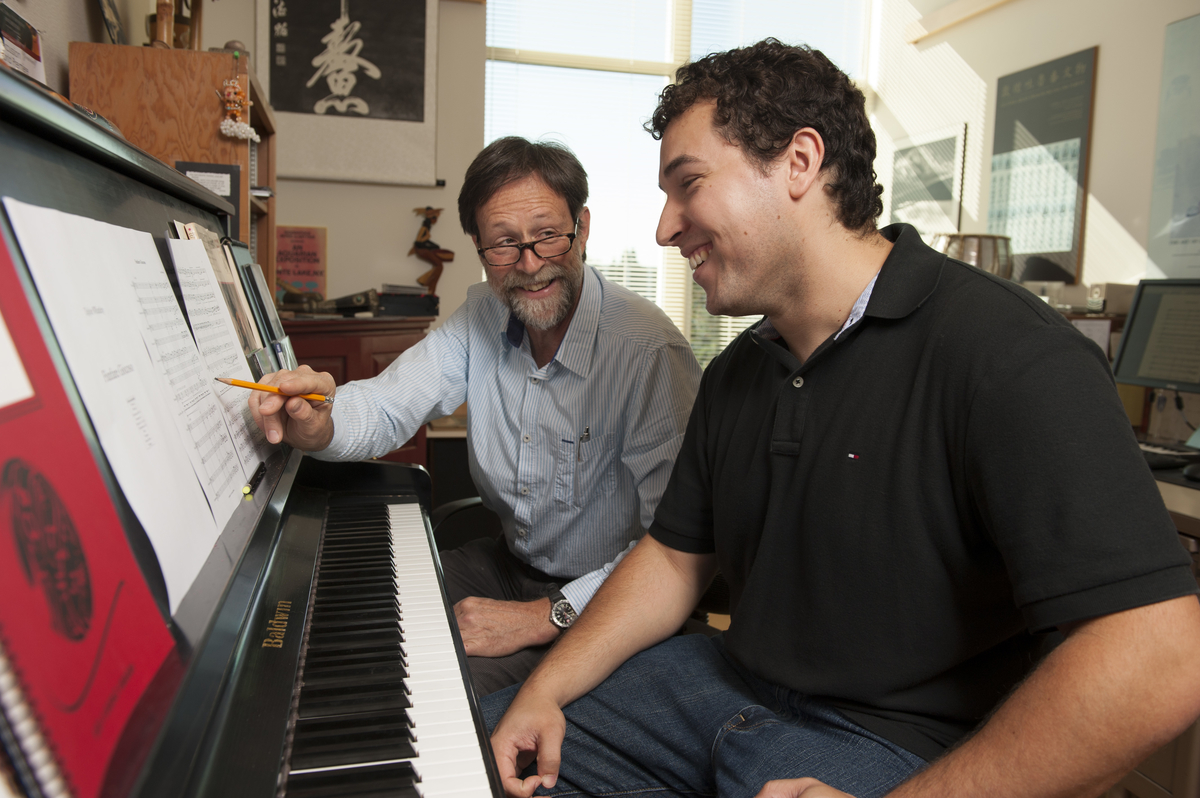 Taylor Whatley, right, works with Prof. Greg Youtz on Whatley's winning composition. (Photo: John Struzenberg '16)