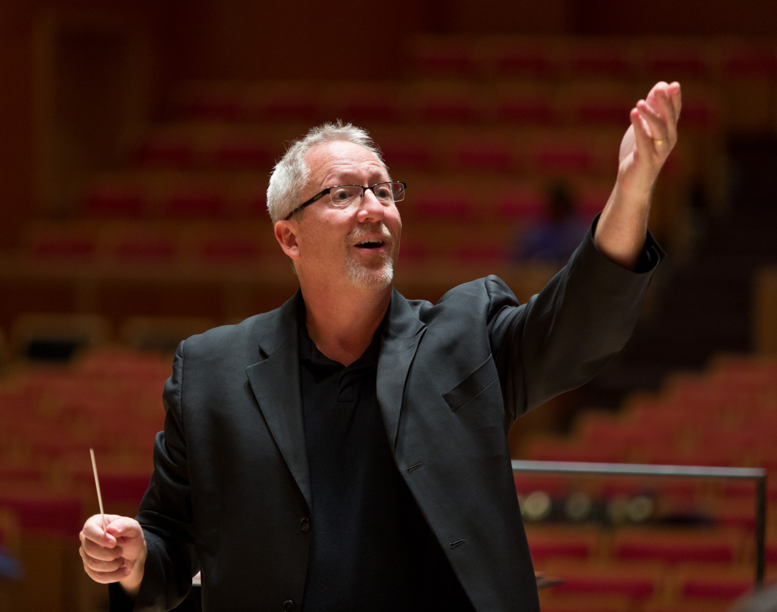 Ed Powell directing the PLU Wind Ensemble on Wednesday, Sept. 18, 2013. (Photo/John Froschauer)