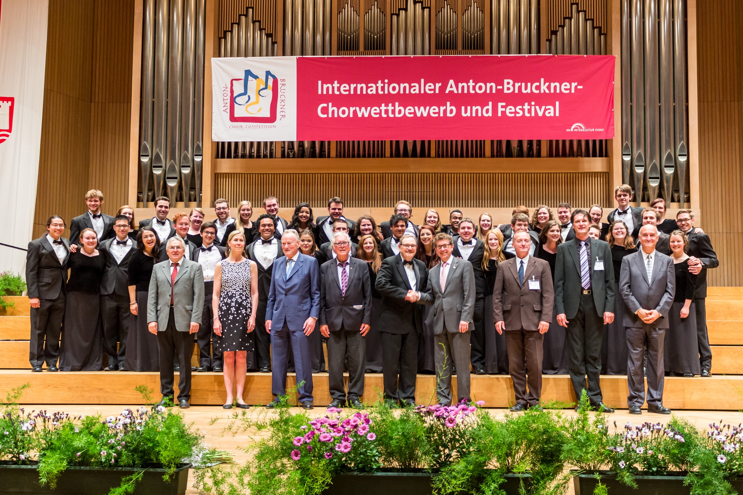 The Choir of the West with jury members after winning the Anton Bruckner Choir Grand Prize Award.