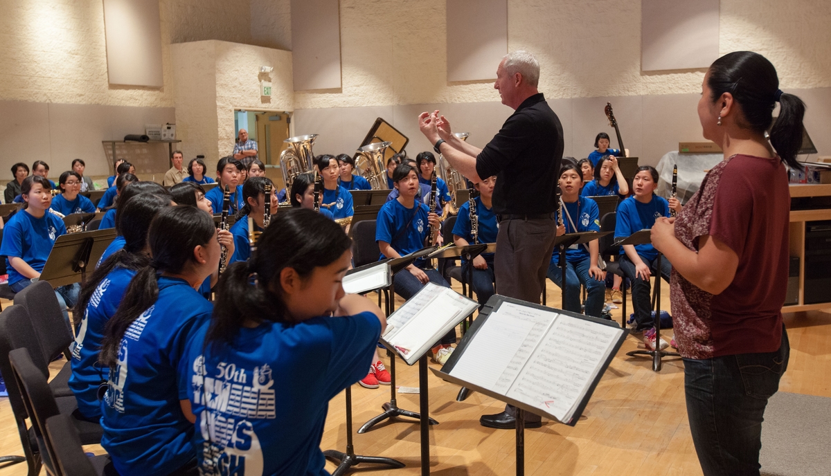 Tamara School Band, of Kumamoto, Japan, in a workshop at PLU with Ed Powell and Ron Gerhardstein and translated by Miho Takekawa on Tuesday, June 7, 2016. The band visits the US every other year with it's sister school Graham Kapowsin. (Photo: John Froschauer/PLU)