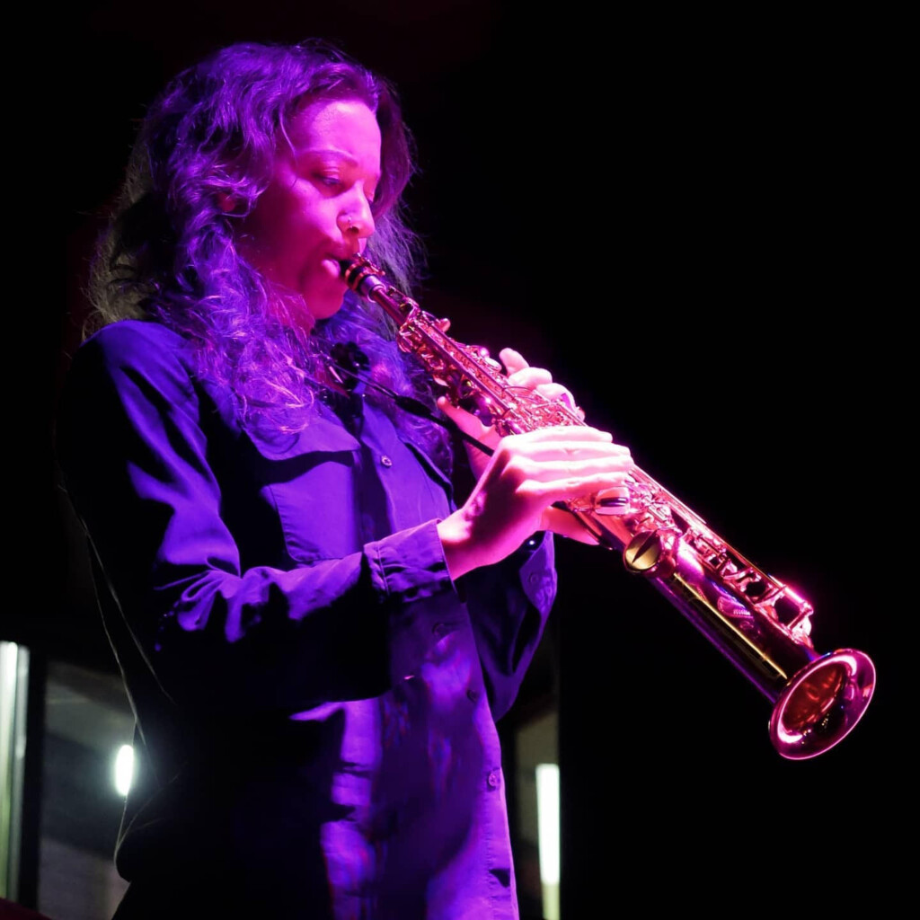 Kate Olson performing with soprano saxophone