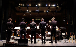 Jazz Ensemble in Karen Hille Phillips Center viewed from behind looking out to the auditorium