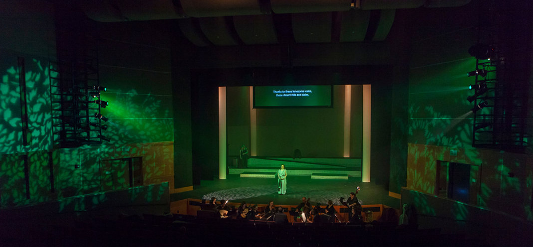 Opera performance in green light.