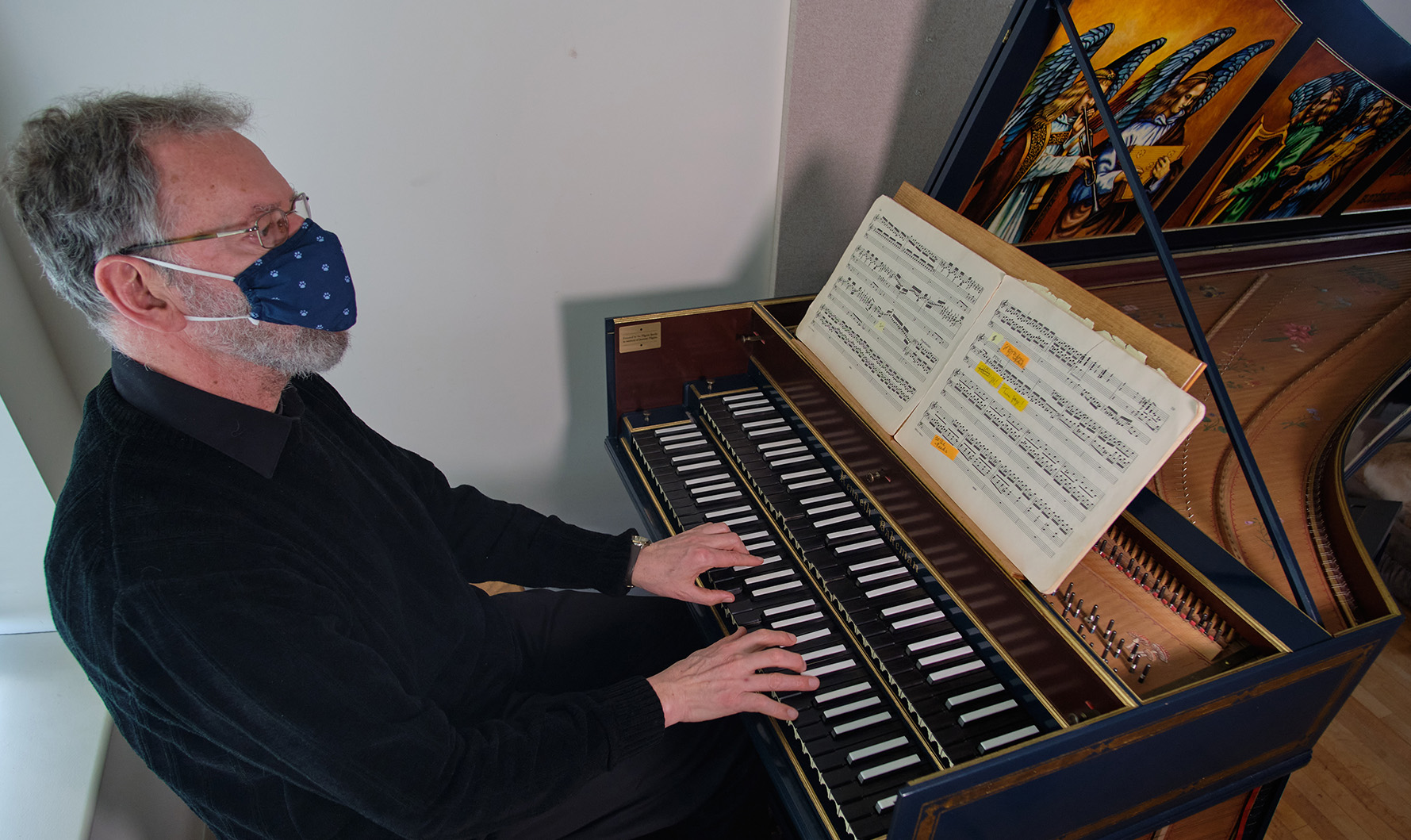 Paul Tegels, organist and Associate Professor of Music Paul Tegels plays the harpsichord donated by the Pilgrim family in his office, Tuesday, Feb. 9, 2021, at PLU. (PLU Photo/John Froschauer)