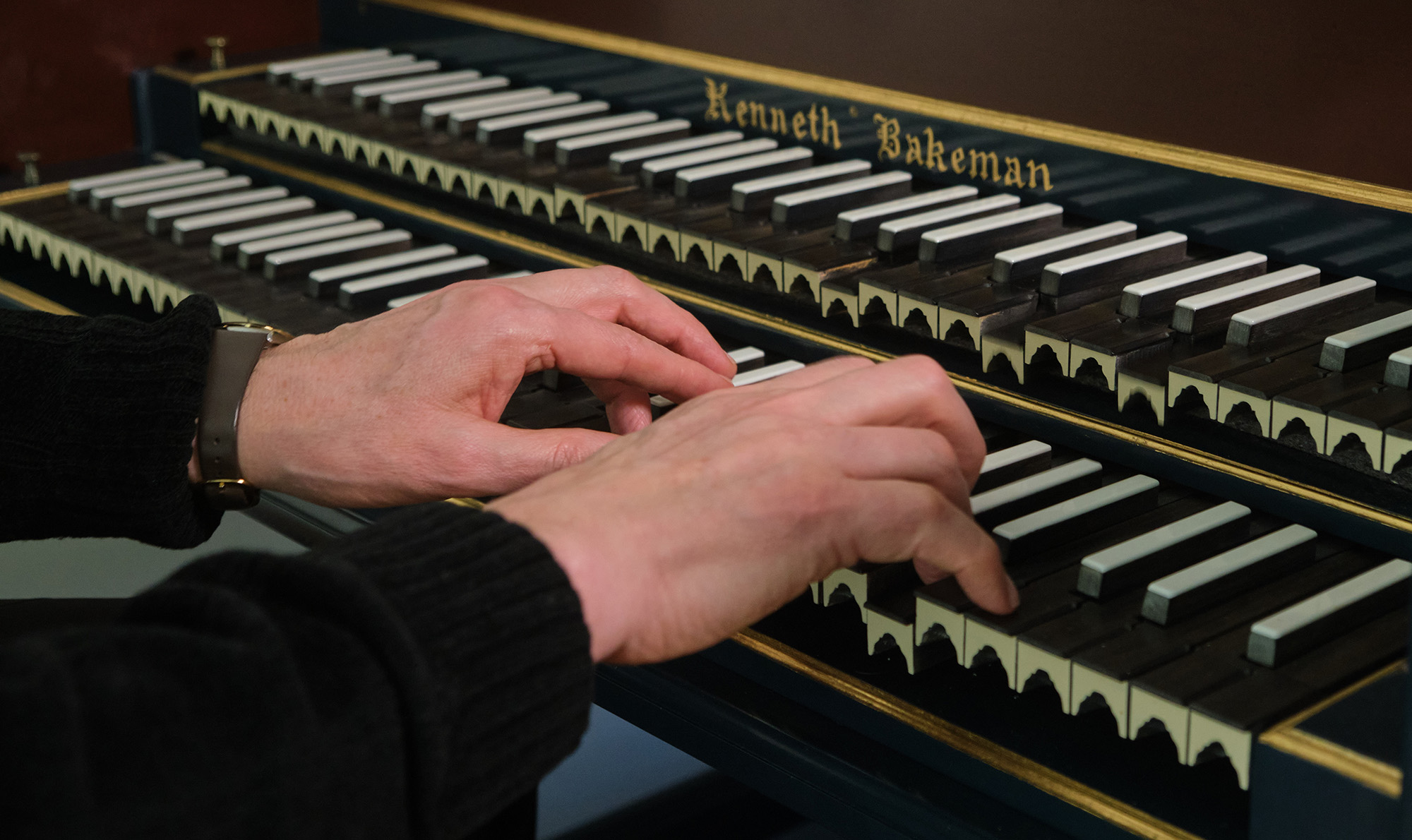 Paul Tegels, organist and Associate Professor of Music Paul Tegels plays the harpsichord donated by the Pilgrim family in his office, Tuesday, Feb. 9, 2021, at PLU. (PLU Photo/John Froschauer)