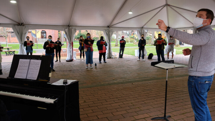 Opera rehearsal in outdoor tent