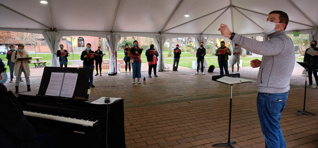 Opera rehearsal in outdoor tent