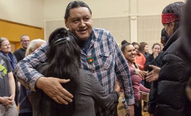 Two people hugging