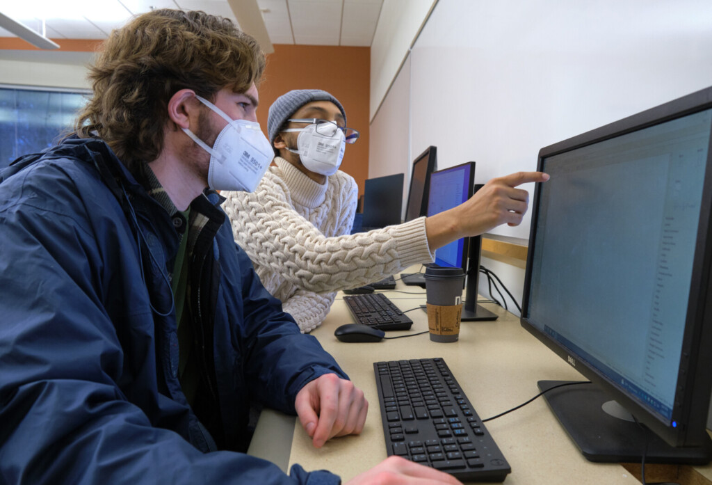 Students working together on a computer