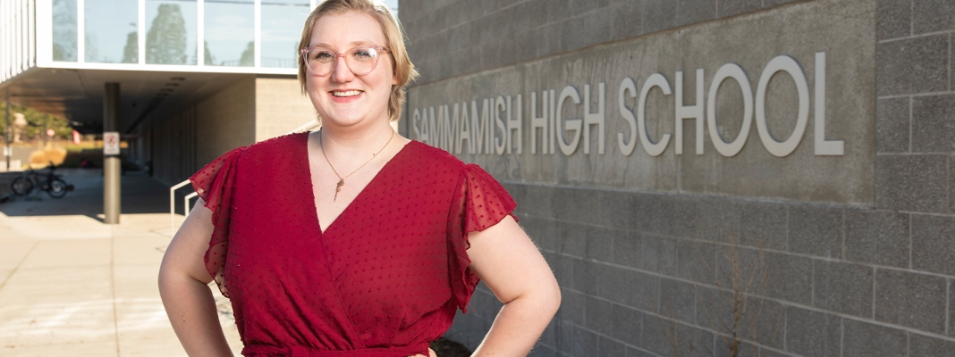 Becca standing in front of Sammamish High school sign