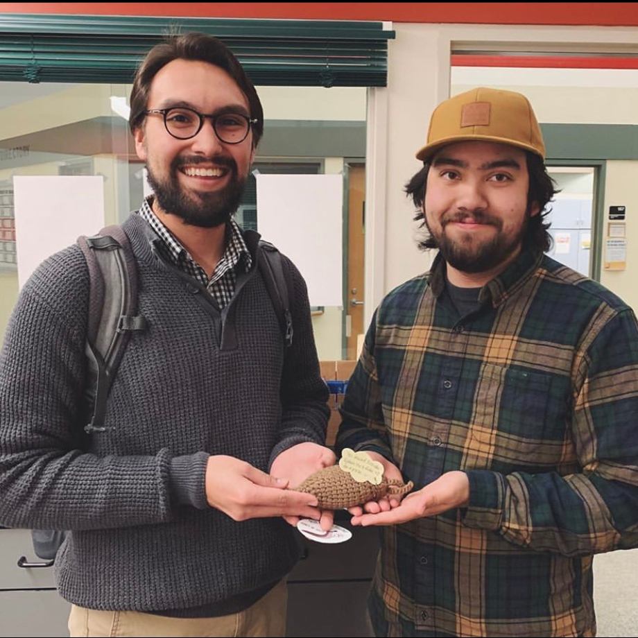 Two students smiling for the camera