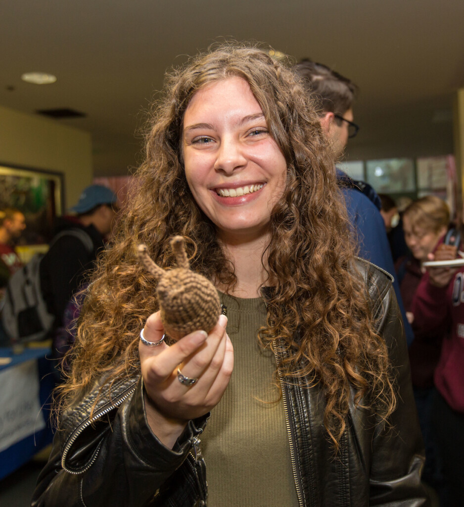 Biology Major Brianna Celix '19 with the crocheted version of Enrieké.