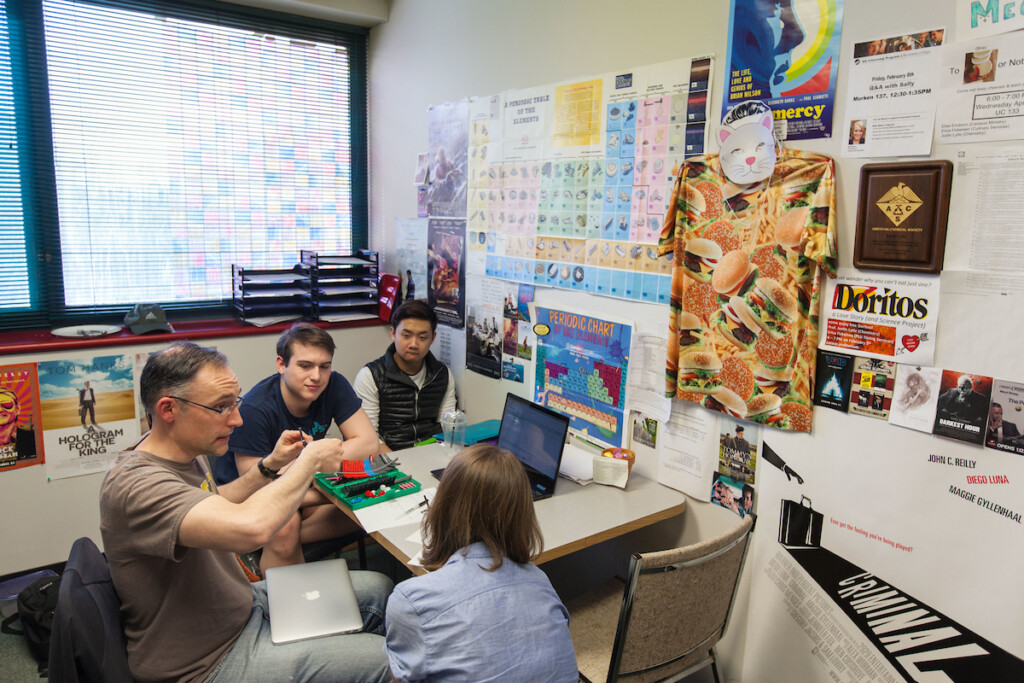 Students talking to Professor