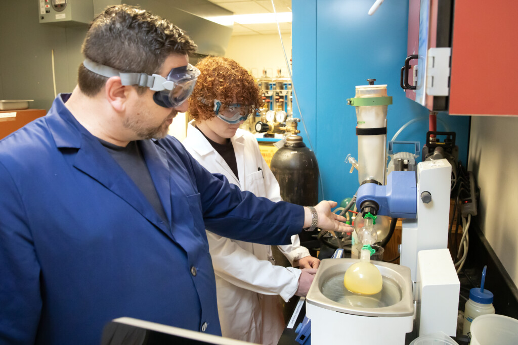 Professor Yakelis and Donnelly working together in open lab in Rieke Science Center.