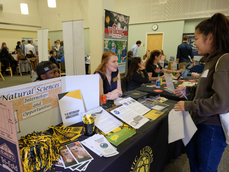 Students talking at an involvement fair