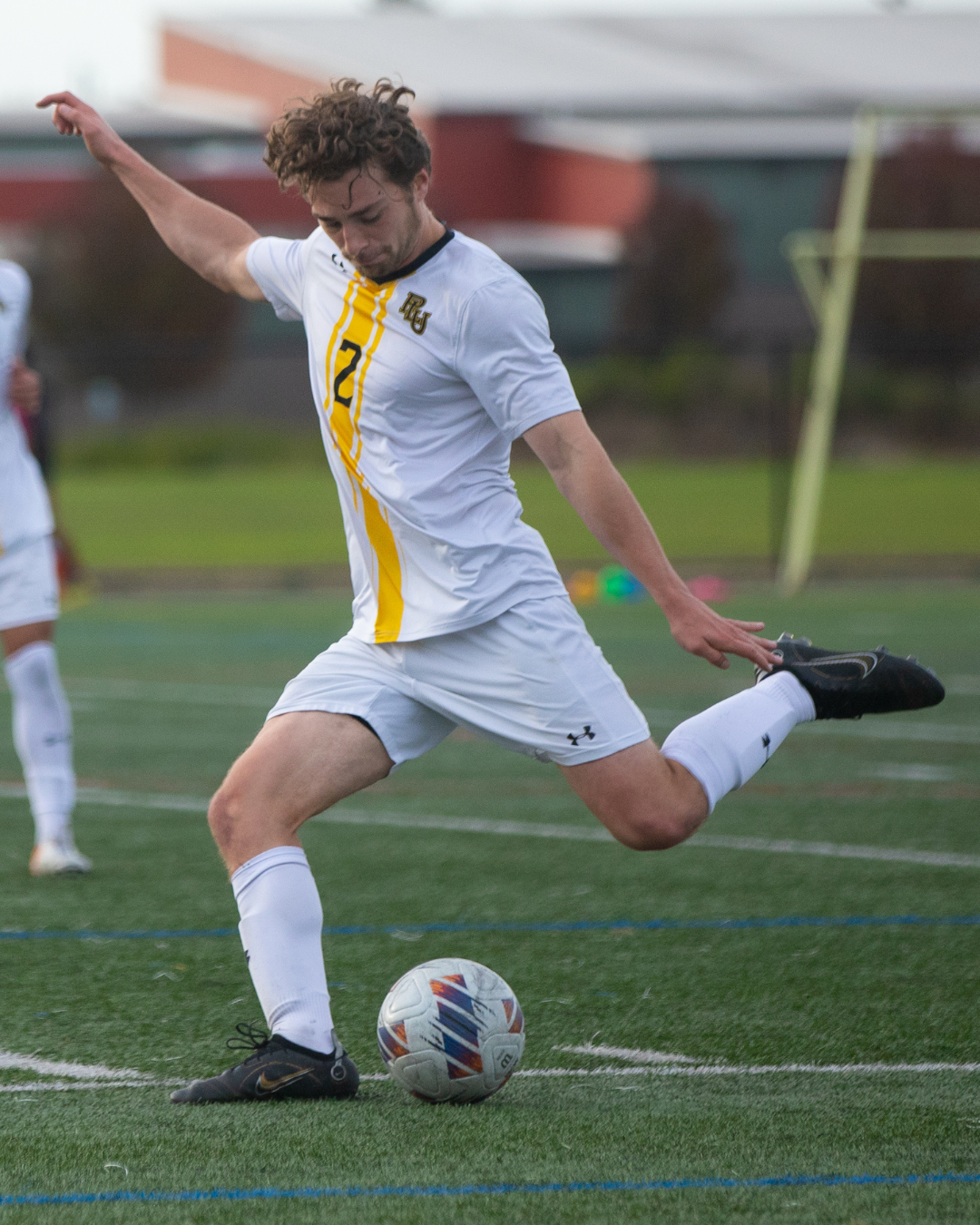 Vinnie D'Onofrio kicking a soccer ball.