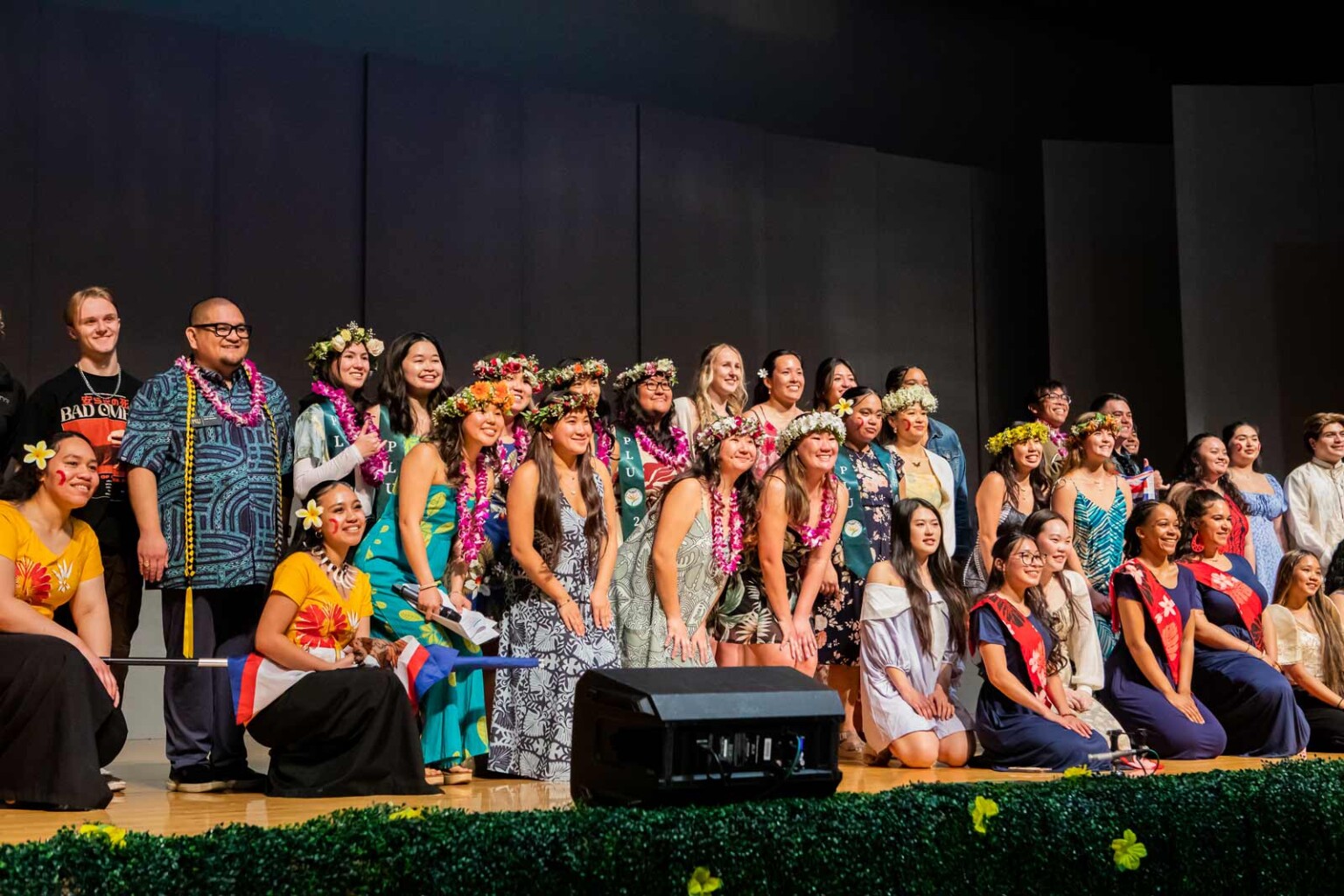 20250503_jm_ho-olaule-a-2025_042-1536x1024 Ashley poses with fellow students from the Nā Hoaloha O Hawai’i club at the Hoʻolauleʻa cultural event, which included local Hawaii-style food, shave ice, Samoan, Hawaiian, and Filipino cultural dances, games, and more.
