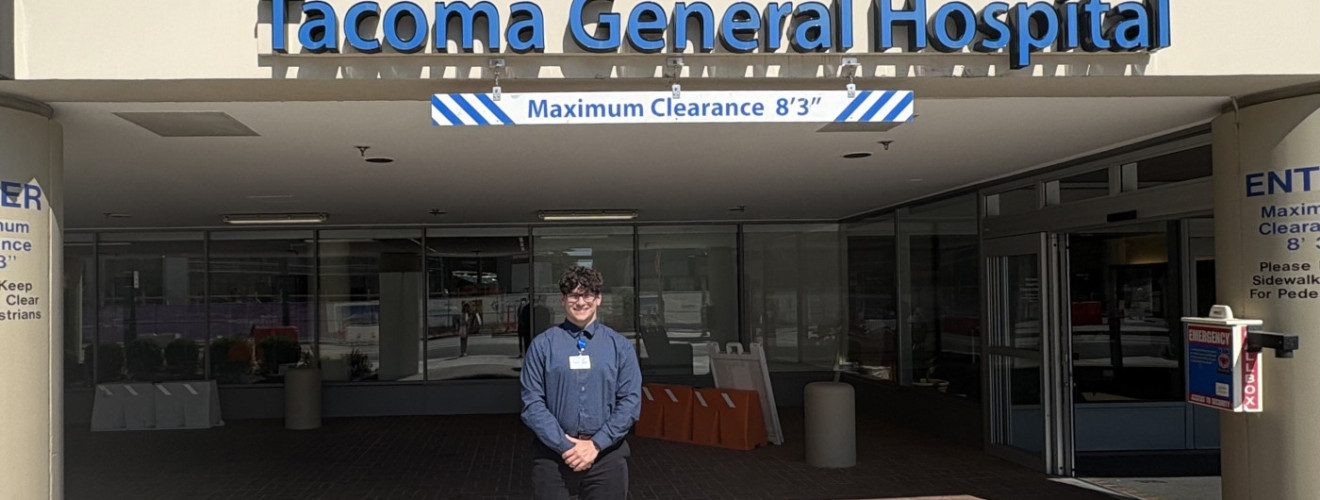 Mason Taylor-Wells in front of Tacoma General Hospital