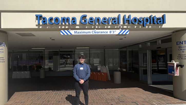 Mason Taylor-Wells in front of Tacoma General Hospital