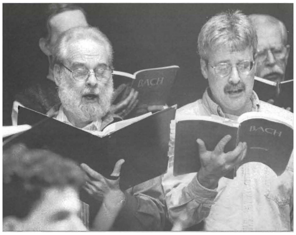 Bill singing in choir_2001 Bill singind during dress rehearsal for the Bach Christmas Oratorio at the Rialto Theater in Tacoma.