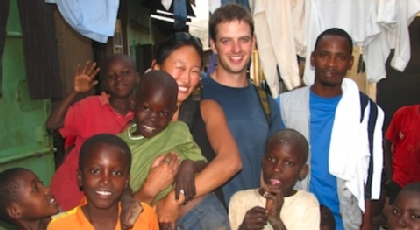 Matt Kennedy ’07 traveled to Uganda between 2008-2010 to organize soccer tournaments. Here is poses with young Ungandans.