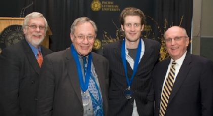 Wang Center Executive Director Neal Sobania, Peace Builder Award recipients William Stafford and Joey Cheek, and PLU President Loren J. Anderson.