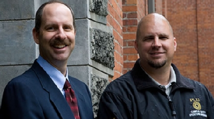 Campus Safety Director Tony Berger and staff work 24-7 to keep the 4,500 students, faculty and staff on the PLU campus safe. Berger is standing by Jason Weaving, Operations Supervisor.