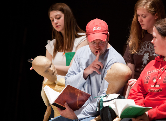 Actors practiced the art of Bunraku puppetry to express Paula Vogle’s play, “The Long Christmas Ride Home.” Pictured here are David Ellis ’11 and Abigal Pishaw ’12, who play the parents in the play. (Photo by John Froschauer)