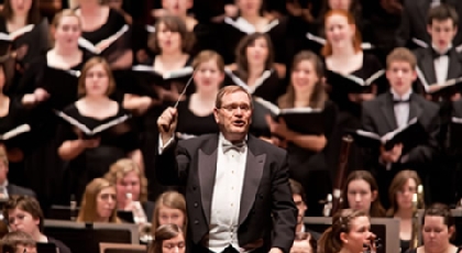 Richard Nance conducting the Orchestra and Choir