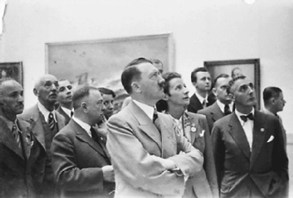 Adolf Hitler touring one of his art exhibits in Germany (Courtesy of National Archives)
