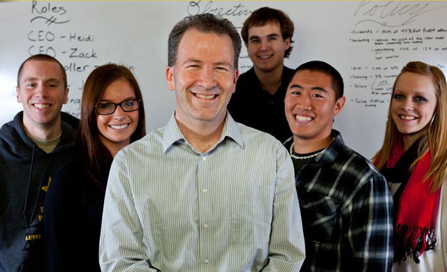 Professor Kory Brown and five of the six students who will be competing in the International Collegiate Business Strategy Competition in Long Beach, Calif., this year.