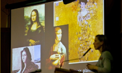 Professor Heather Mathews talks about the plunder of art during WWll by the Nazis during the 2012 Holocaust Conference. (Photo by John Froschauer)