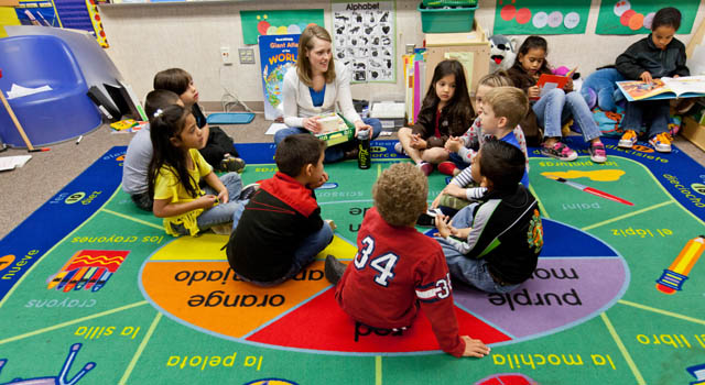 Jenna Serr '06, '10 in her kindergarten class at James Sales Elementary. (Photos by John Froschauer)