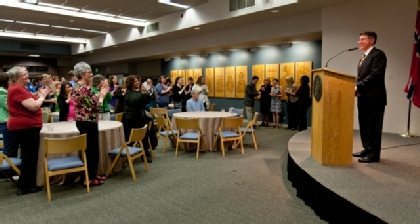 President Thomas Krise speaks to the crowd at the June 1 reception. (Photo by John Froschauer)