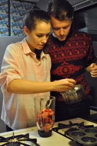 Griswold and Eric Olson ’14 prepare the filling for Griswold’s famous Strawberry Champagne cupcakes.