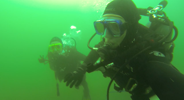 James Olson ’14 scuba diving for class credit