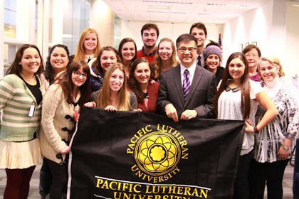 PLU students meet with the U.S. Ambassador to China (and former Washington State governor) Gary Locke.