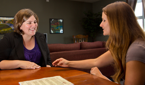 Jessica McGifford ’12 and Abi McLane ’08 at the Crystal Judson Family Justice Center.