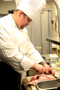 PLU chef Chuk Blessum will compete in the National Association of College & University Food Services March 21. (Photos by Jesse Major ’14)