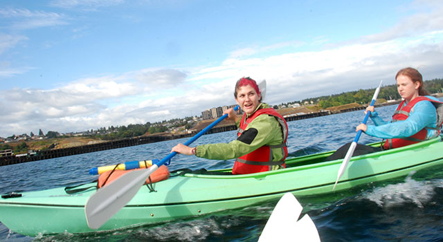 Two students kayaking the Puget Sound